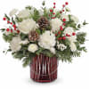 This Christmas bouquet carries your best wishes for a joyful holiday season