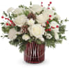 This Christmas bouquet carries your best wishes for a joyful holiday season
