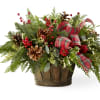 Can you smell the winter season? This basket of evergreens, cones and