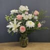 Beautiful pink and white arrangement perfect for any occasion.