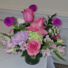 Roses, Hydrangea,  Cremons, Dahlias,  Astromeria, Hypericum, Ruscus, Fancy Greens