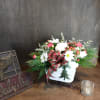 Red and white flowers with holiday trim and no roses