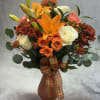 Embrace the beauty of fall with our exquisite fall Blossoms arrangement!
Handcrafted with