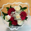 The GO OP Wrapped Rose &amp; Gerb Bouquet by Savilles Country Florist.