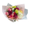 A soft yet striking bouquet blending romantic blush tones with vibrant berry