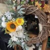 Bright and cheery are Sunflowers. Surrounded with ribbons . This is a