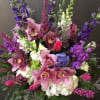 A tall stunning vase for a funeral that can easily be brought