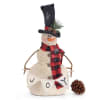 Rustic looking snowman with a red and black plaid scarf, a black