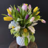 30 tulips surrounded by mini green hydrangeas, mass flowers and craspedia. 