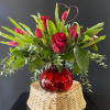 This arrangement is super sweet with tulips and roses.  Fragrant and