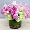 Orchids, Peonies and Hydrangeas compliment each other perfectly as they rise from