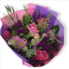Enhance any room with our stunning bouquet of purple and pink flowers