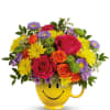 Brighten someone&rsquo;s day with this cheerful arrangement of colorful blooms, artfully displayed