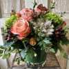 This elegant fall centerpiece is a beautiful mix of roses, hydrangea and