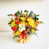 Pumpkin Spice Blooms is a warm, inviting arrangement bursting with autumn charm.