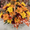 A basket of fall blooms, perfect for that special someone.

Colors of flowers