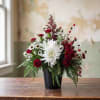 Winter Warmth Christmas Flowers

Bring the festive cheer of the season into any