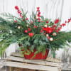 Santa&#039;s sled is full of fragrant greens, berries and bells. A cheerful
