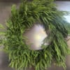 A basic artificial pine Christmas wreath. Perfect for customizations or for more
