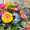 Brighten someone&rsquo;s day with our Bright and Colorful Designer&rsquo;s Choice Arrangement, handcrafted