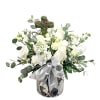 Faith is an all white arrangement full of white blooms, eucalyptus and