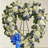 Show your sympathy with a gift of flowers. Artfully arranged by a