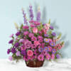 The Gracious Lavender Basket features Soothing lavender, respectful purple and compassionate pinks