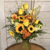 Daydreaming of warmer days already? This arrangement is a reminder that winter