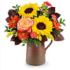 Sunburst Harmony Bouquet features peach roses, orange miniature carnations, yellow sunflowers, bronze