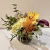 A beautiful arrangement with vibrant blooms that captures the essence of a
