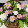 Take a walk through a country meadow with this fresh flower basket!
