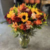 A big arrangement with all fall colors. 