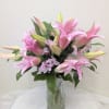 Pink lilies stand tall and beautiful. Send an impactful gift to somebody