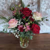 Rich reds and rosie pinks with accents of white make for a