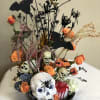 All the scary bits plus white hydrangea and orange spray roses to