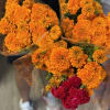 Pictured here are 3 bunches with a small coxcomb bunch. Marigold bunch