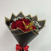 Beautiful bouquet composed of 12 long-stemmed red roses, delicately surrounded by baby
