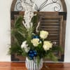 White and Blue arrangement in silver and white vase.