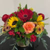 Beautiful arrangement in a 5&quot; x 5&quot; gold glass vase filled with
