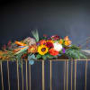 Bountiful lush beautiful collection of fall colors in this table centerpiece for