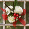 Beautiful White and Red Corsage for the holidays. Each one will be