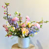 Custom design with premium seasonal blooms that will express appreciation to all