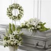 The serenity tribute trio package Includes: Flower basket, Casket Spray, and round