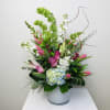 Perfect for any occasion, this arrangement is stunning, overflowing with lavender roses