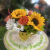 Put a smile on their face with this mug of sunny blooms!
Pet
