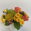 Oranges, yellows and greens. Crisp &amp; clean. Hydrangeas, roses, berries, and yarrow