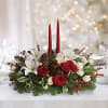Dazzling accents such as glittered pinecones and silver ornaments add a festive