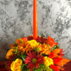 This fall centerpiece is full of beautiful fall flowers. this arrangement is