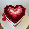 Heart-shaped box filled with roses in three colors (30 roses approx.). Flowers
