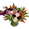Kale, roses, stock, scabosia, orchids and fall greens designed in a clear